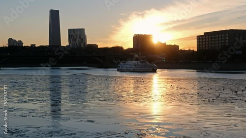 Video of the Moscow River during ice drift with a passing pleasure yacht. Moscow. Russia photo