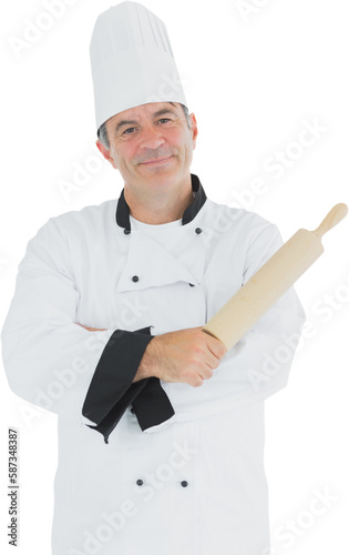 Portrait of smiling male chef holding rolling pin