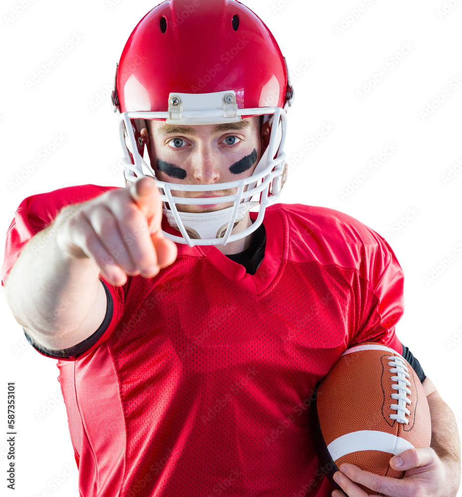 Portrait of american football player holding football and pointing to camera