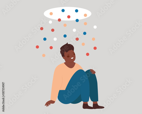 Creative man looks at the source of creation, innovation and inspiration. Person sits under a falling stream of confetti, opens up new ideas and dreams. Freedom, improvement or development concept.

