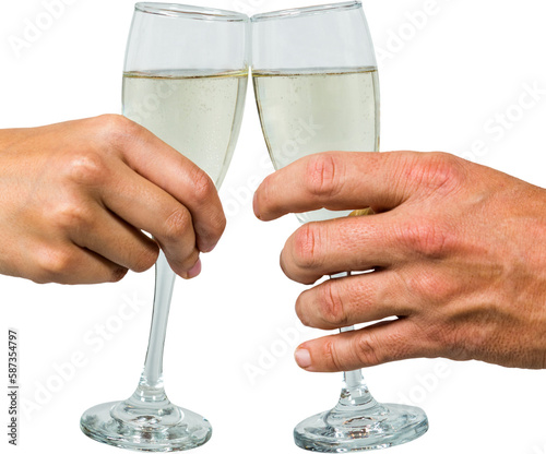 Cropped hand of couple toasting champagne flute