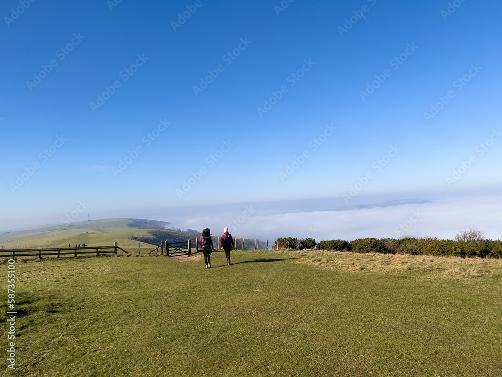 Walking on the South Downs in bright sunny weather Walking on the South Downs in bright sunny weather