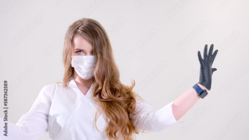 the dentist holds in his hands dental instruments, dressed in black gloves, close-up. dentistry. High quality the dentist holds in his hands dental instruments, dressed in black gloves, close-up. dentistry. High quality