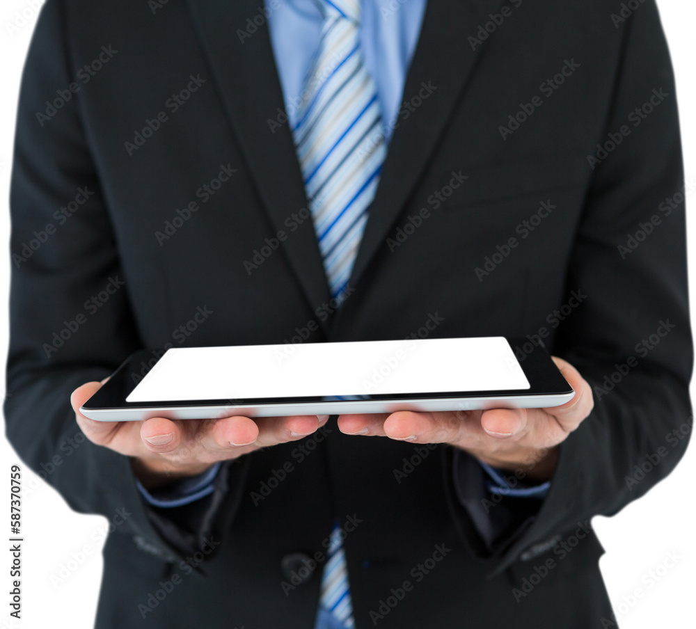 Midsection of businessman holding tablet computer Midsection of businessman holding tablet computer