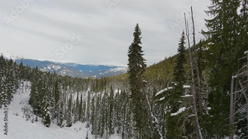 Blackcomb Mountain Ski Resort in Winter Season. Whistler, British Columbia, Canada. Slow Motion Cinematic photo