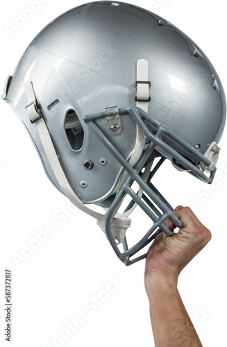 Close-up of American football player handing his sliver helmet