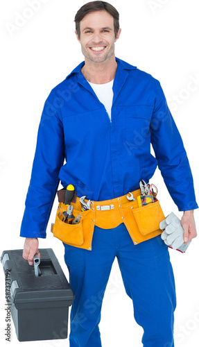 Confident repairman carrying tool box