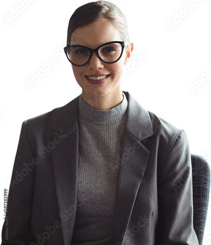 Fotografia Portrait of smiling businesswoman sitting on chair