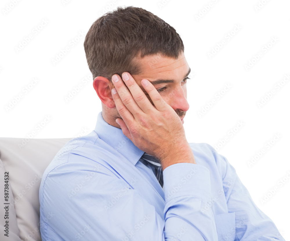 Upset businessman sitting on sofa Upset businessman sitting on sofa