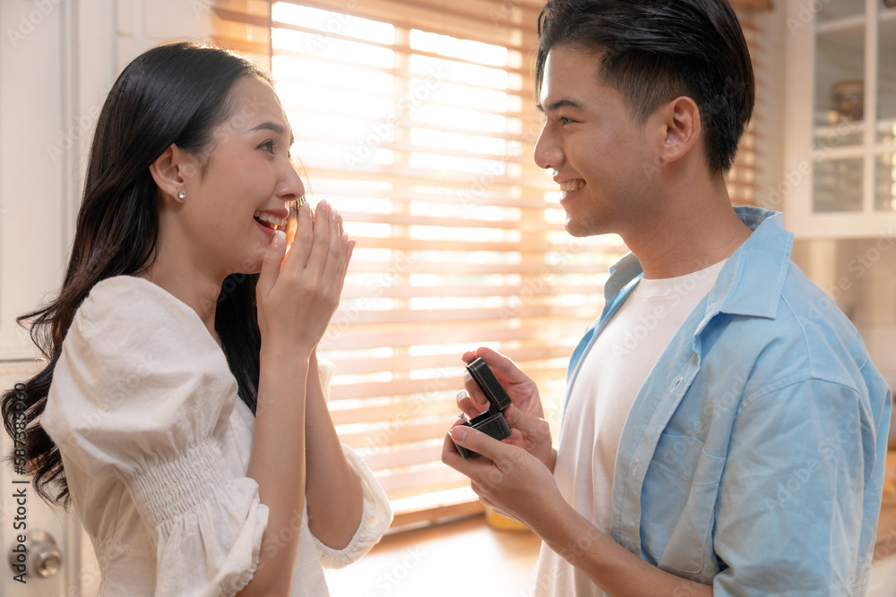Happy asian family, Husband surprises wife with gift on wedding anniversary. Happy asian family, Husband surprises wife with gift on wedding anniversary.