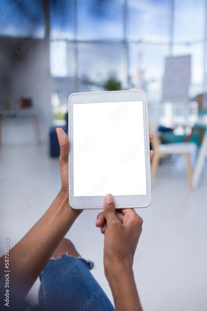 Female executive using digital tablet Female executive using digital tablet
