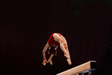 female gymnast athlete exercise on balance beam gymnastics, sports summer games