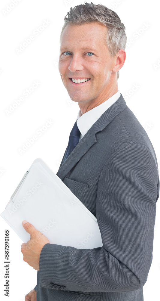 Portrait of smiling businessman holding clipboard