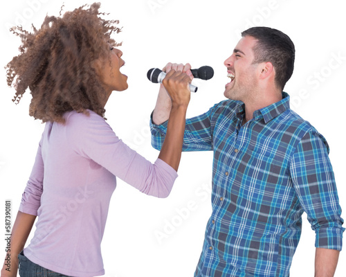 Fun duo singing to each other at karaoke