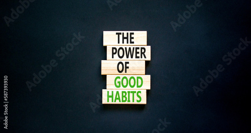 The power of good habits symbol. Concept words The power of good habits on wooden block. Beautiful black table black background. Business the power of good habits concept. Copy space.