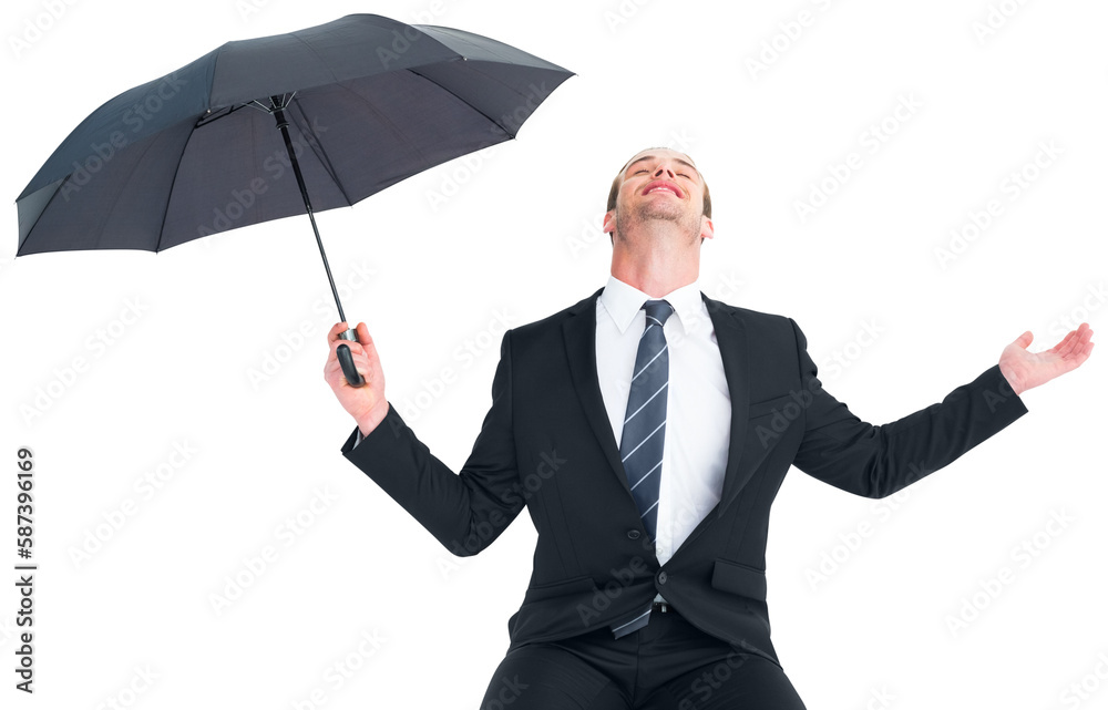 Businessman sheltering under black umbrella testing Businessman sheltering under black umbrella testing