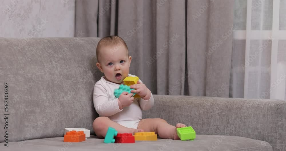 cute baby girl playing with colorful toy blocks cute baby girl playing with colorful toy blocks