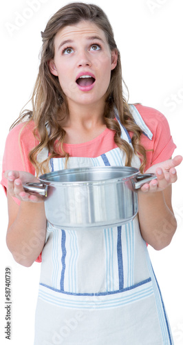 Surprised hipster woman holding pressure cooker