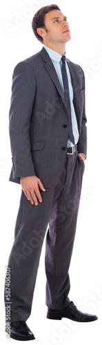 Serious businessman with hand in pocket