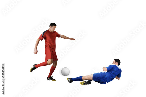 Fototapeta Naklejka Na Ścianę i Meble -  Football players tackling for the ball