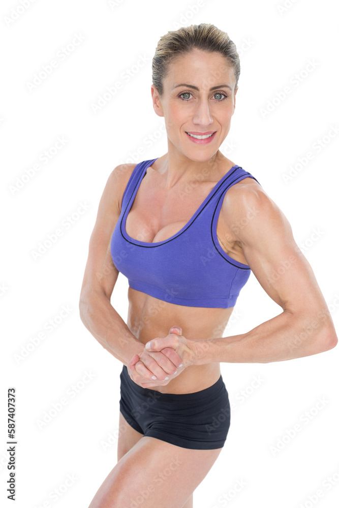 Strong blonde posing with hands together Strong blonde posing with hands together