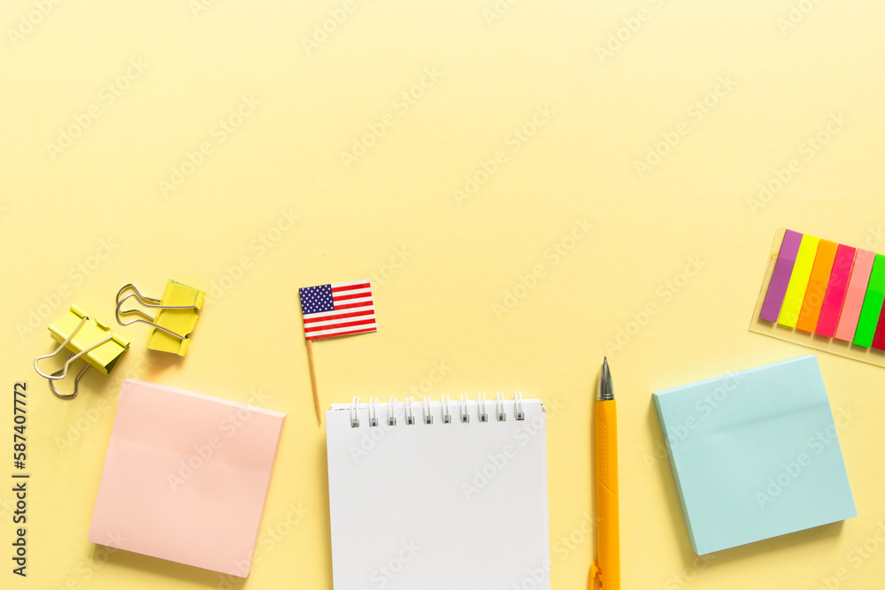 Back to school background. School accessories on a yellow background. Back to school background. School accessories on a yellow background.
