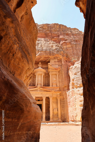 the treasury or Al-khazneh in petra view from the siq in sunny day