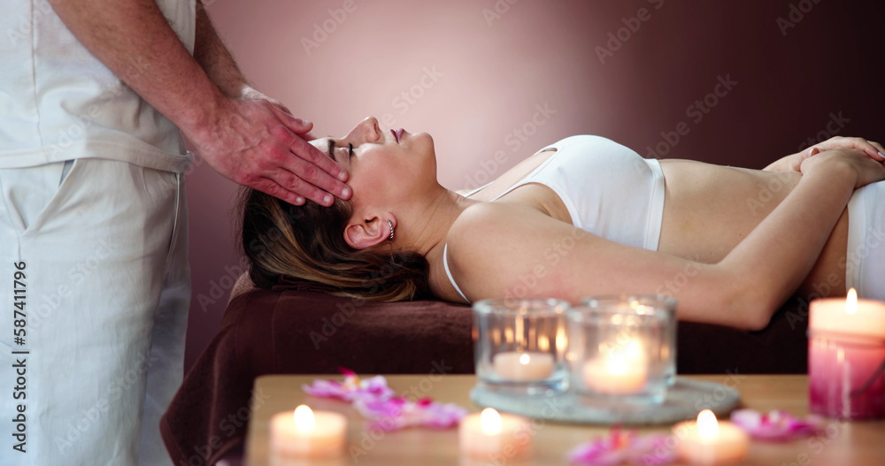 Young Woman Receiving Head Massage Young Woman Receiving Head Massage