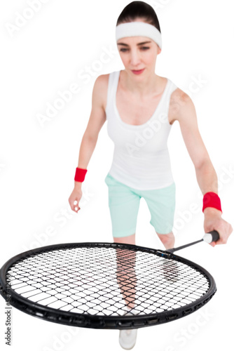 Badminton player with racket