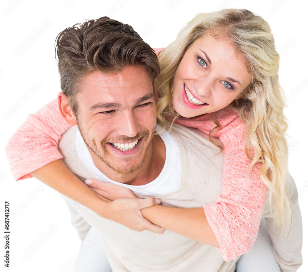 Handsome man giving piggy back to his girlfriend Handsome man giving piggy back to his girlfriend