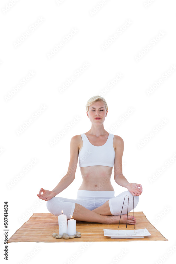 Woman meditating on bamboo mat Woman meditating on bamboo mat