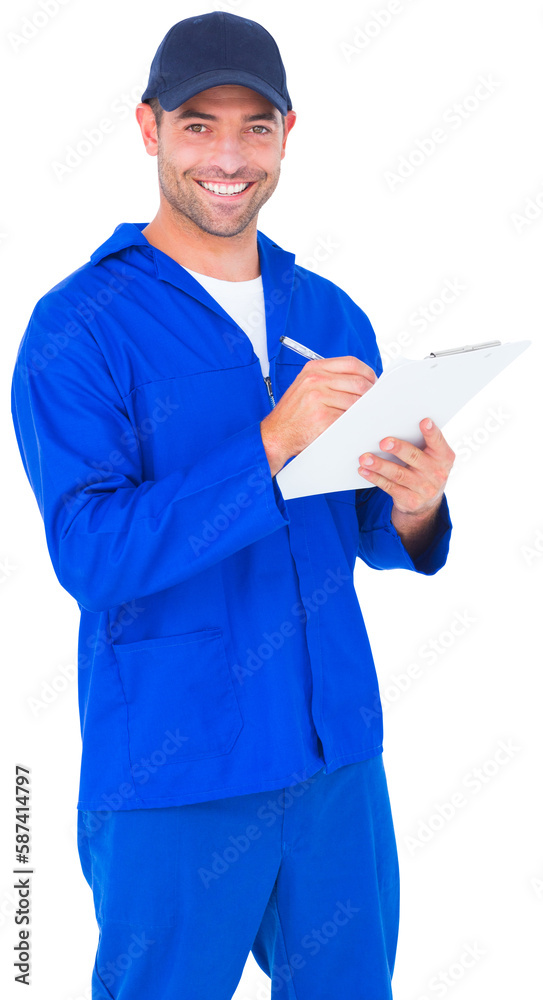 Portrait of happy male mechanic writing on clipboard Portrait of happy male mechanic writing on clipboard