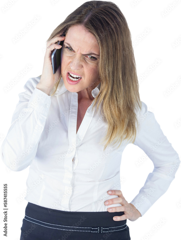 Angry businesswoman talking on mobile phone Angry businesswoman talking on mobile phone