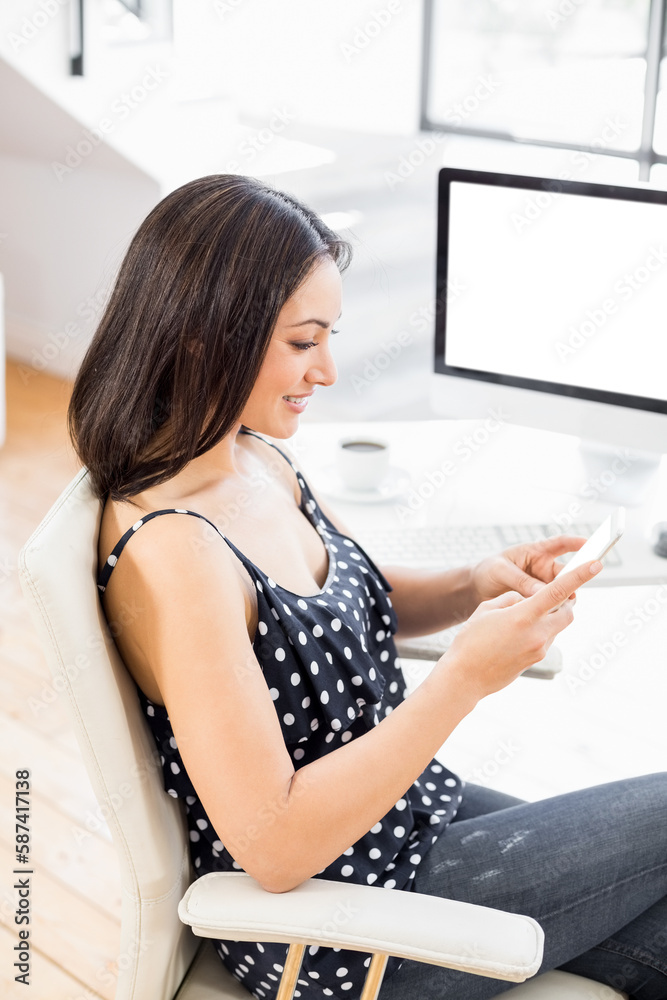 Young woman using mobile phone Young woman using mobile phone
