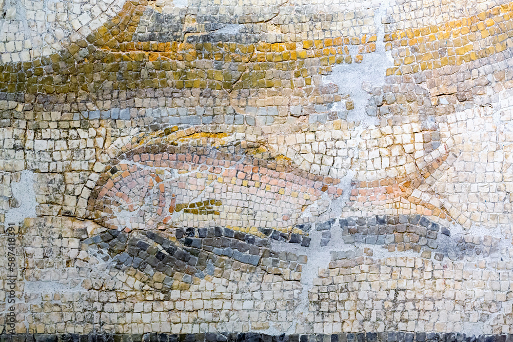 Ancient roman mosaic. Close up fragment. Floor, stone background, Alanya (Antalya province), Turkey (Turkiye).