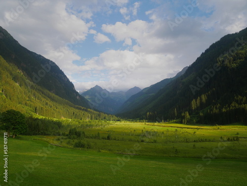 Scenic mountain landscape with beautiful valley and mountain peaks