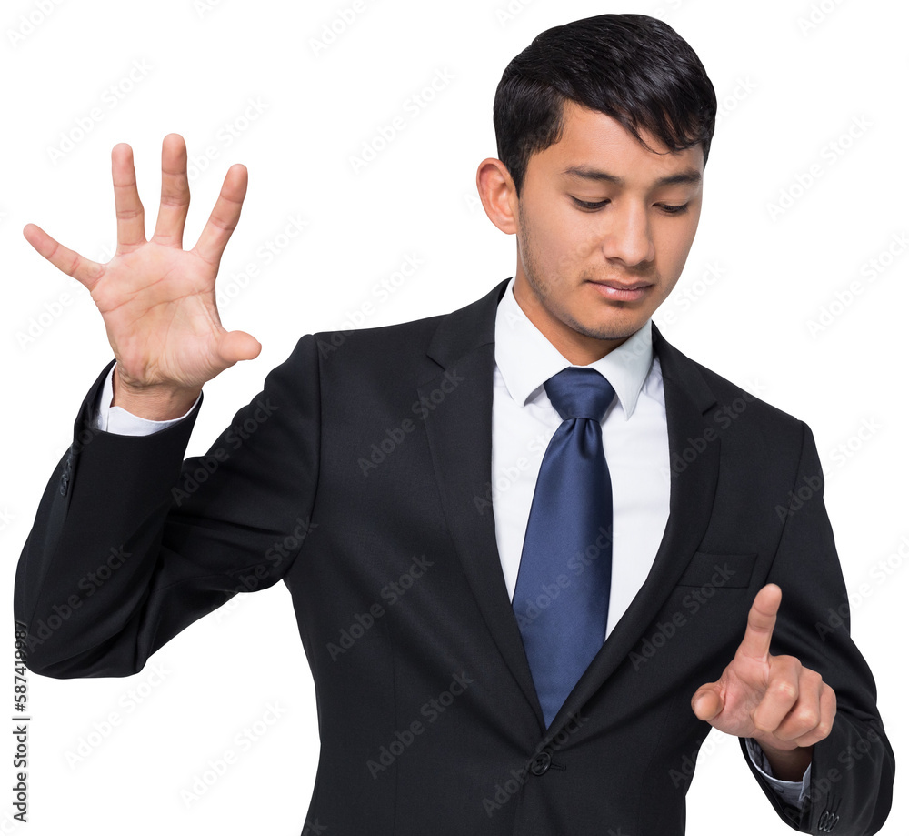 Unsmiling businessman holding and pointing Unsmiling businessman holding and pointing