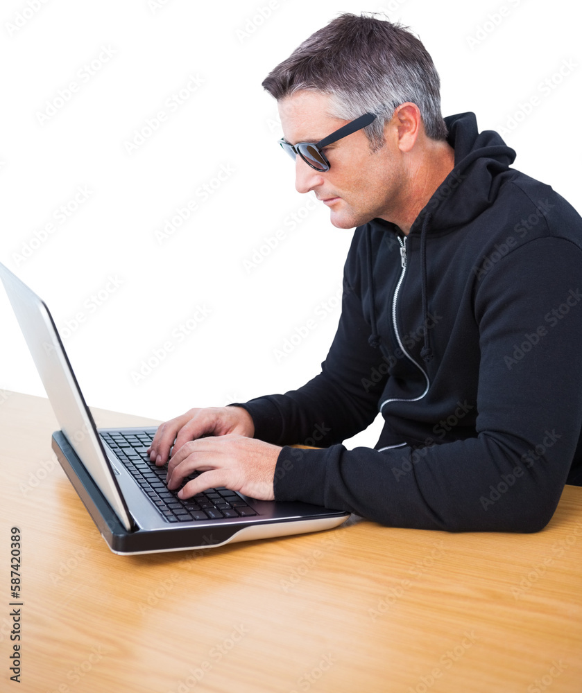 Businessman using laptop at desk