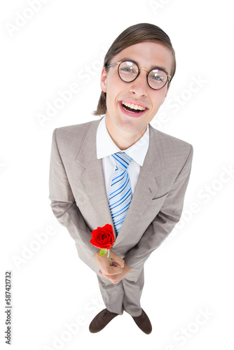 Geeky lovesick hipster holding rose 