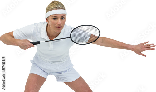 Female athlete holding a badminton racquet ready to serve  © vectorfusionart