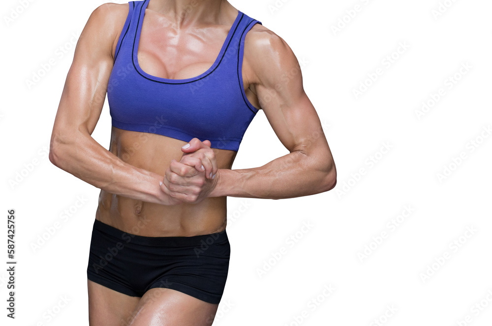 Midsection of fit woman with hands clasped Midsection of fit woman with hands clasped