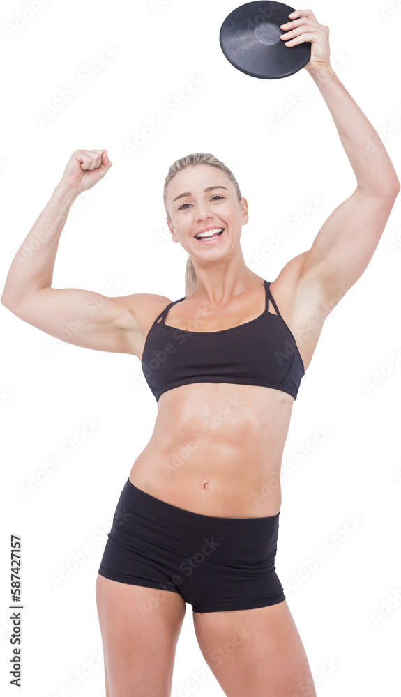 Happy woman holding discus while standing