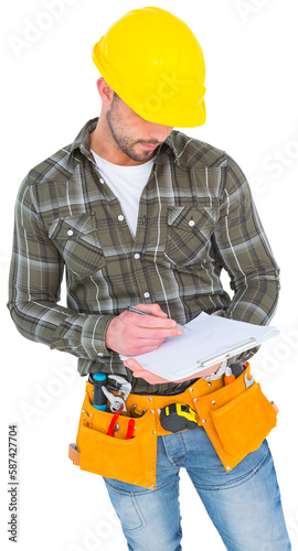 Manual worker writing on clipboard