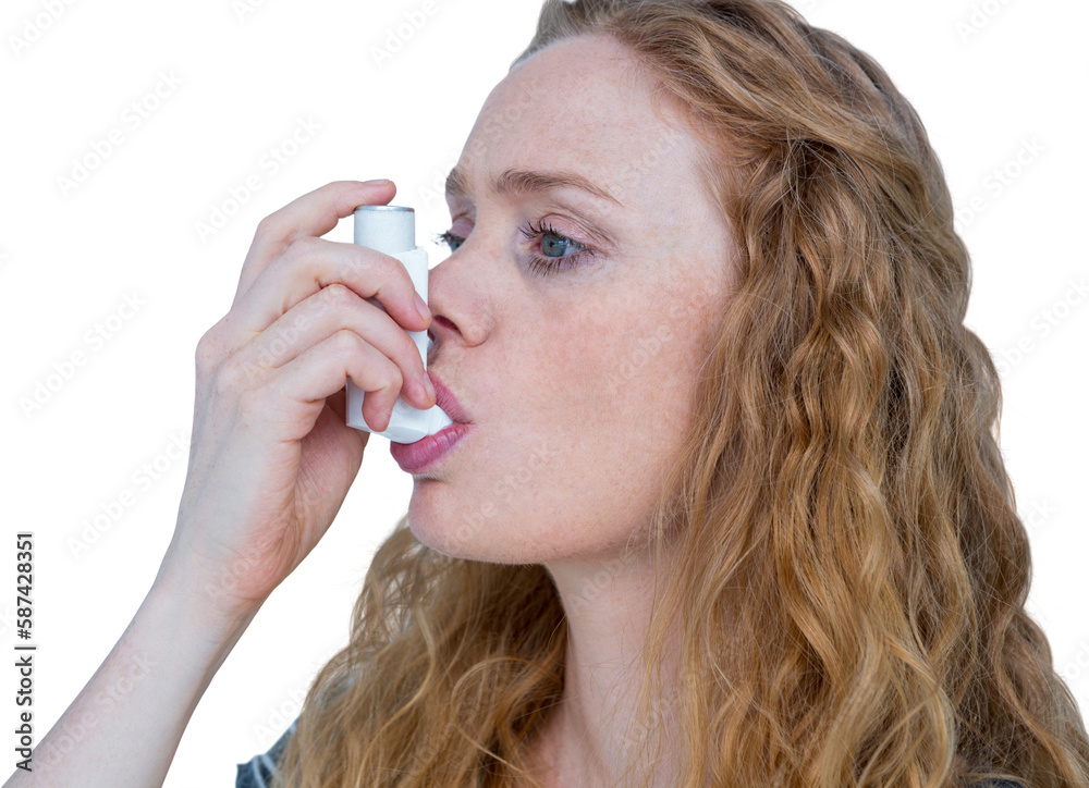 Close-up of woman using the asthma inhaler Close-up of woman using the asthma inhaler