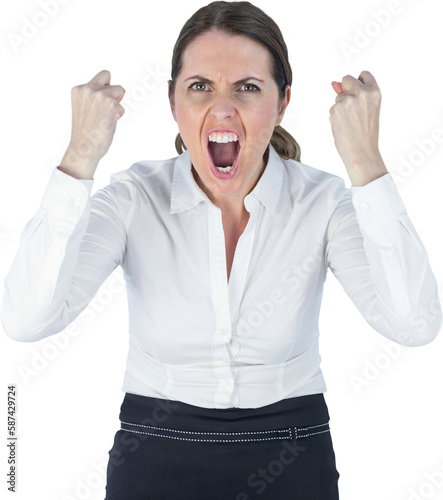 Portrait of screaming businesswoman clanching fists