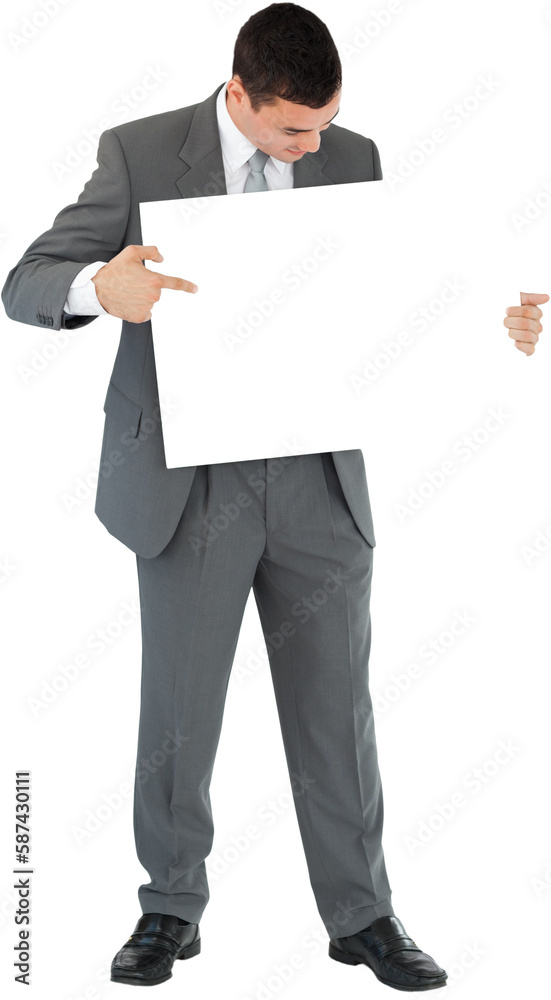 Businessman pointing at sign in his hands Businessman pointing at sign in his hands
