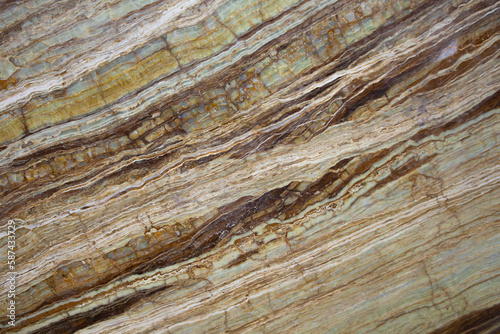 Natural tavertine with green onyx inclusion diagonal structure