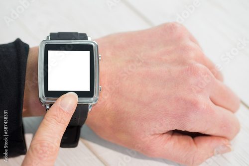 Businesswoman using a smart watch