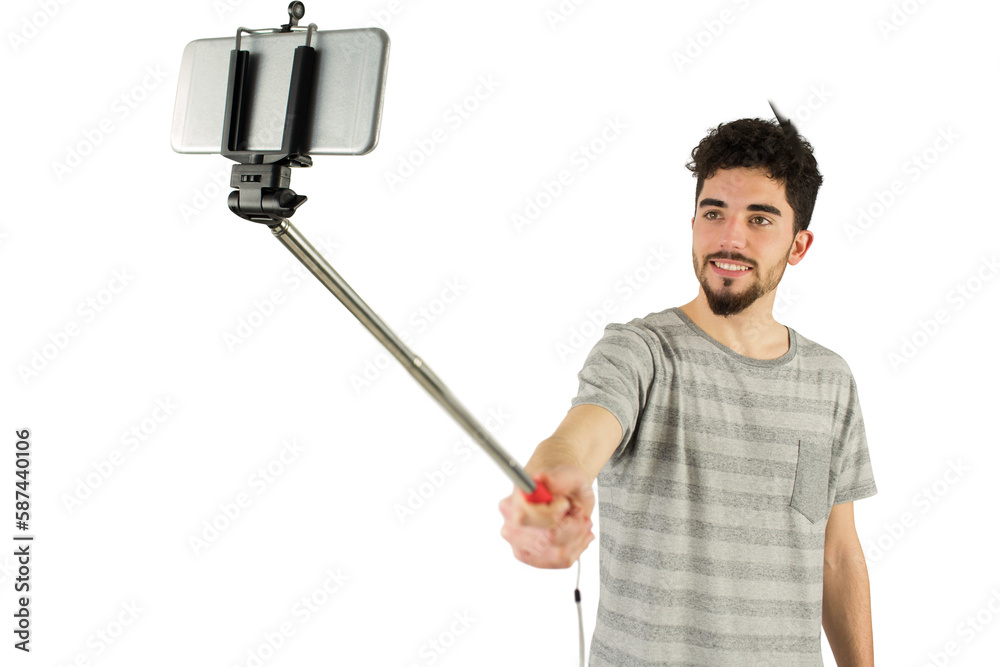 Casual man using a selfie stick