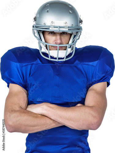 Portrait confident of American football player with arms crossed